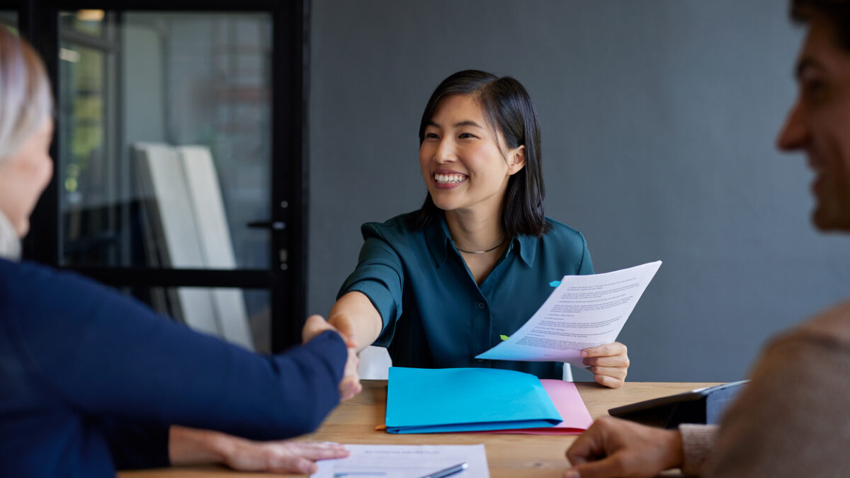 title insurance agent meeting with clients