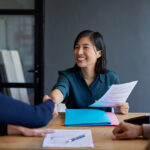 title insurance agent meeting with clients