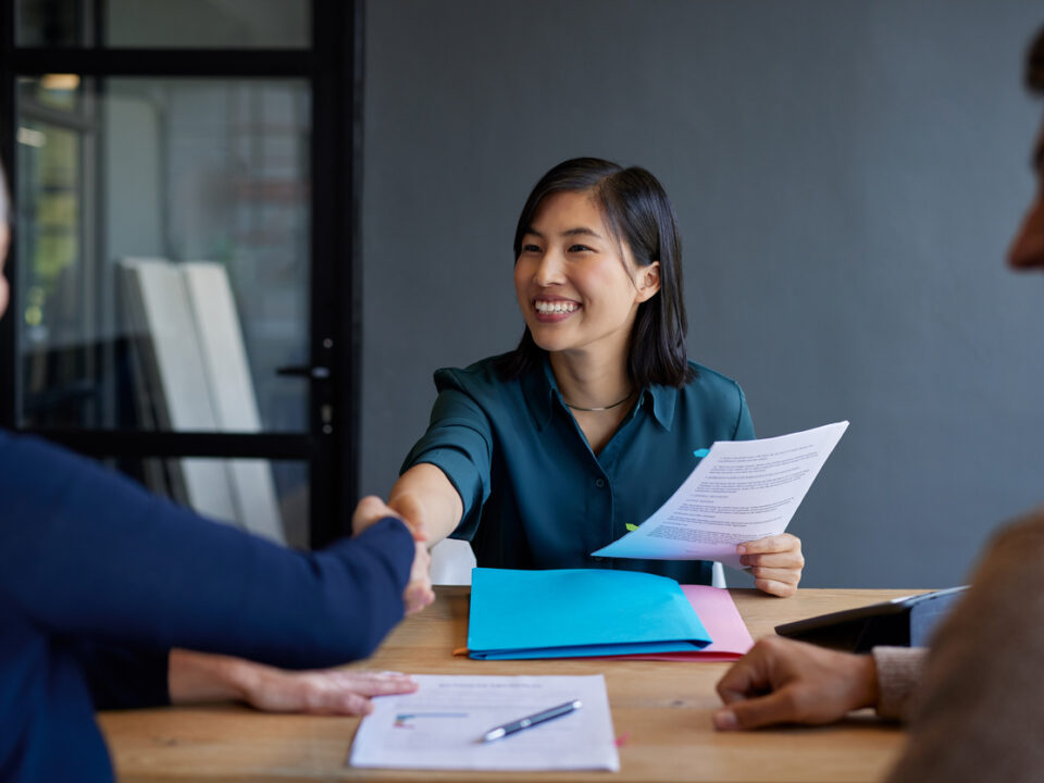 title insurance agent meeting with clients